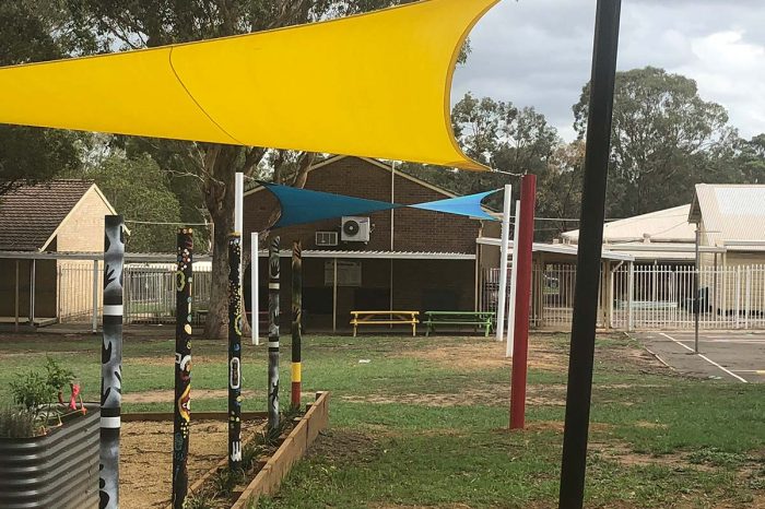 Yellow Shade Sail Gives Protection For Children In A Sydney School Play Area